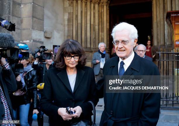 Former Prime minister Lionel Jospin and his wife Sylviane Agacinski-Jospin leave the church after attending French author Regine Deforges's funeral...