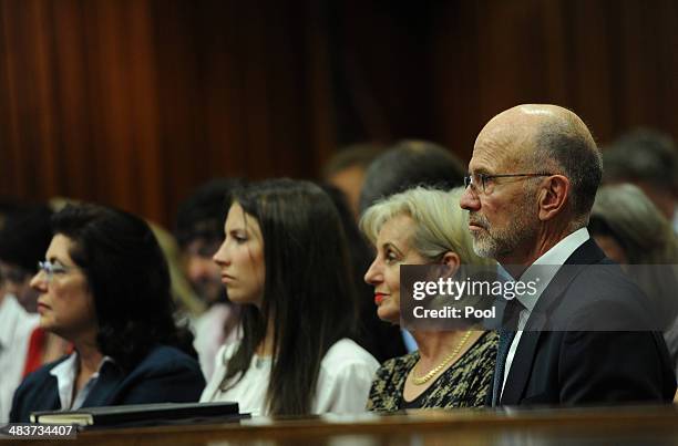 Aimee, Lois and Arnold Pistorius listen to Oscar's testimony in the Pretoria High Court on April 10 in Pretoria, South Africa. Oscar Pistorius stands...