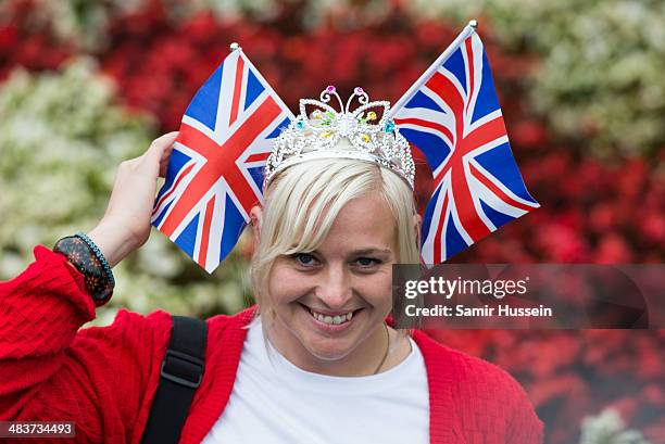 Well wisher waits to see Catherine, Duchess of Cambridge and Prince William, Duke of Cambridge attend a wreathlaying service at the War Memorial in...