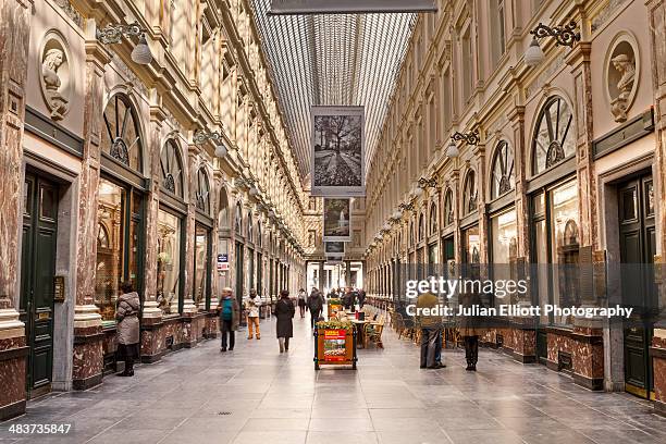 the galeries royales saint-hubert. - adult man brussels stock pictures, royalty-free photos & images