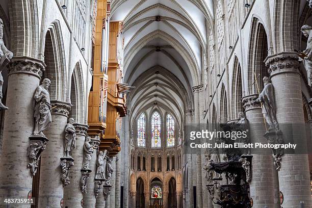 the nave of brussels cathedral. - cathedral of st michael and st gudula stock pictures, royalty-free photos & images