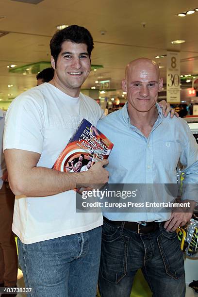 Julian Contreras poses with Nacho Villalba during the presentation of his new book 'Entrenamiento Personalizado y Alimentacion' at El Corte Ingles...