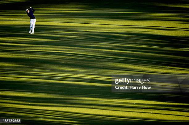 Stewart Cink of the United States hits his second shot on the second hole during the first round of the 2014 Masters Tournament at Augusta National...