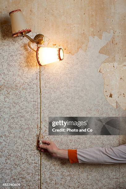 old tapestry and light a lamp old - beaten up stockfoto's en -beelden