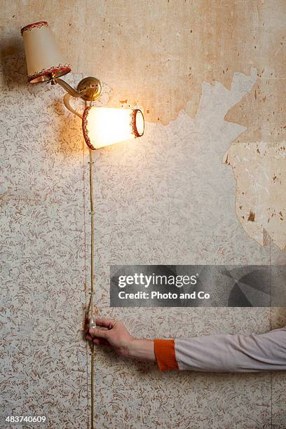 old tapestry and light a lamp old - beaten up stock pictures, royalty-free photos & images