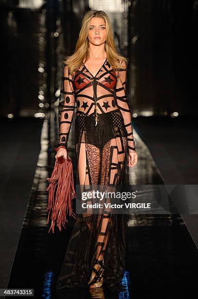 Model walks the runway during the Lilly Sarti show at Sao Paulo Fashion Week Spring Summer 2014/2015 at Parque Candido Portinari on April 2, 2014 in...