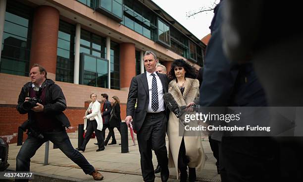 Former deputy speaker of the House of Commons Nigel Evans leaves Preston Crown Court, with unidentified friends after being found not guilty of...