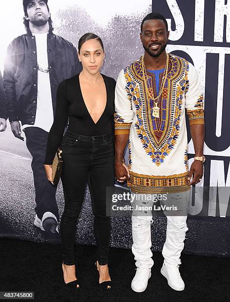Actor Lance Gross and Rebecca Jefferson attend the premiere of "Straight Outta Compton" at Microsoft Theater on August 10, 2015 in Los Angeles,...