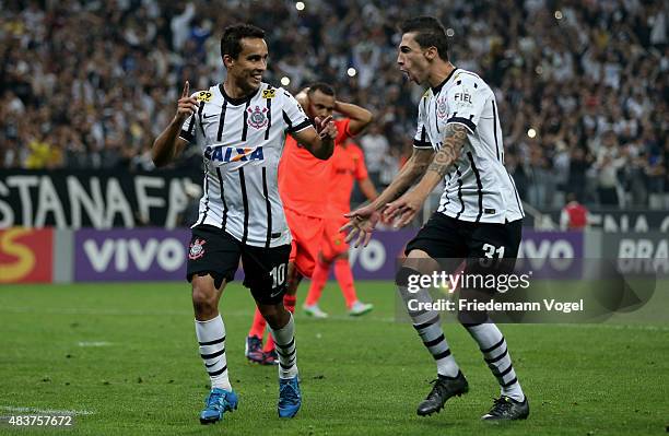 Jadson of Corinthians celebrates scoring the fourth goal with Rildo during the match between Corinthians and Sport Recife for the Brazilian Series A...