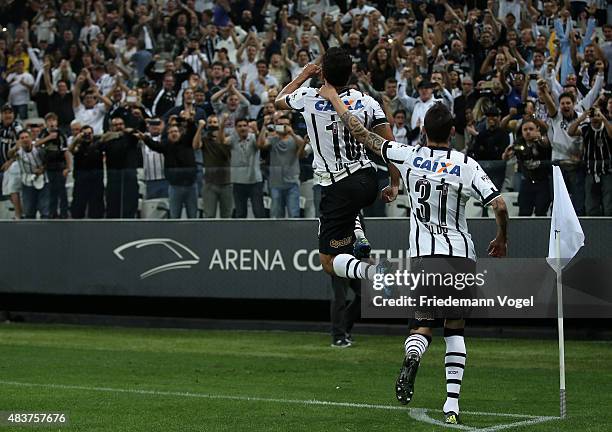 Jadson of Corinthians celebrates scoring the fourth goal with Rildo during the match between Corinthians and Sport Recife for the Brazilian Series A...