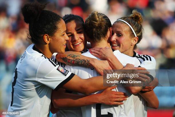 Anja Mittag of Germany scores his team's second goal with team mates Bianca Schmidt, Lena Lotzen and Celia Sasic during the FIFA Women's World Cup...