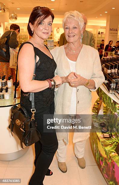 Finty Williams and Dame Judi Dench attend the Shop with the Stars, a public shopping evening to celebrate The Olivier Awards with MasterCard, to...