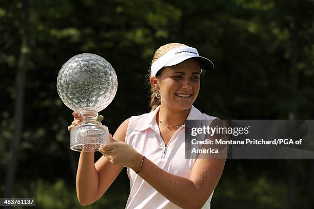 Girls Division Champion Alexis Thompson with her trophy at the awards ceremony on hole 18 green following the final round of play at the 34th Junior...