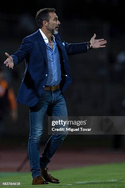 Gustavo Matosas coach of Atlas gestures during a 4th round match between Pumas UNAM and Atlas as part of the Apertura 2015 Liga MX at Olimpico...