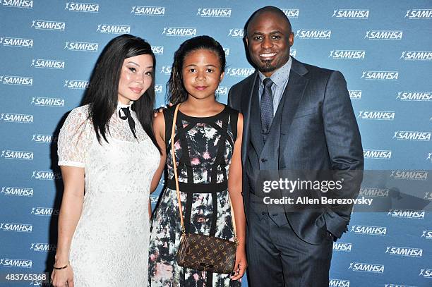 Actor Wayne Brady, daughter Maile Masako Brady and actress Mandie Taketa attend the 10th Annual Voice Awards at Royce Hall, UCLA on August 12, 2015...