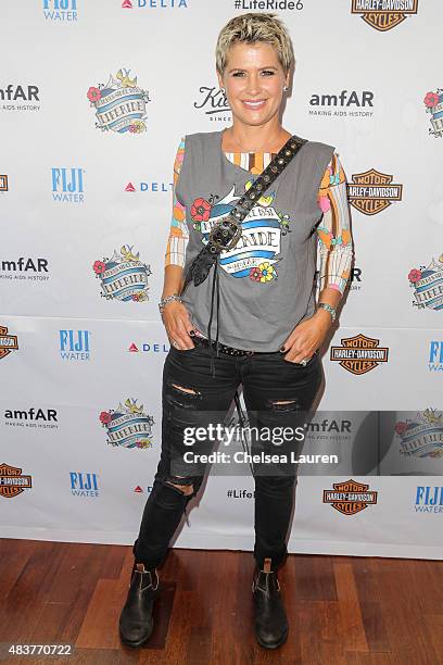 Actress Kristy Swanson arrives at the 6th annual Kiehl's LifeRide for amfAR celebration at Kiehl's Since 1851 on August 12, 2015 in Santa Monica,...