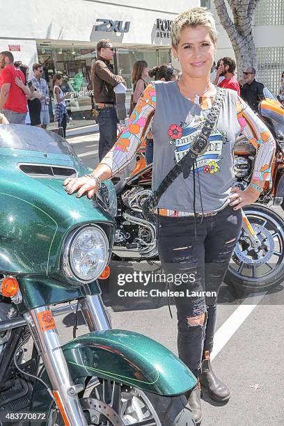 Actress Kristy Swanson arrives at the 6th annual Kiehl's LifeRide for amfAR celebration at Kiehl's Since 1851 on August 12, 2015 in Santa Monica,...