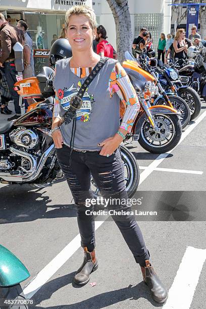 Actress Kristy Swanson arrives at the 6th annual Kiehl's LifeRide for amfAR celebration at Kiehl's Since 1851 on August 12, 2015 in Santa Monica,...