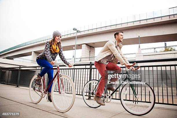 urban cyclists - denver summer stock pictures, royalty-free photos & images