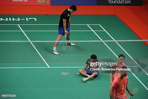 Liao Min Chun and Chen Hsiao Huan of Taipei react after defeated by Xu Chen and Ma Jin of China in the 2015 Total BWF World Championship at Istora...