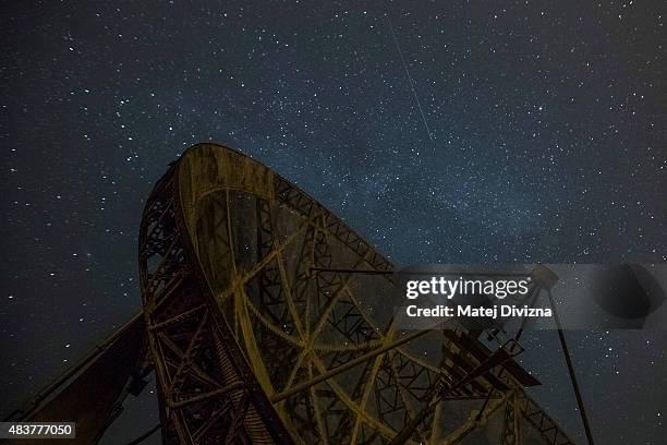 Perseid meteors streaks across the sky over the radar near the Astronomical Institute of the Academy of Science of the Czech Republic on August 12,...