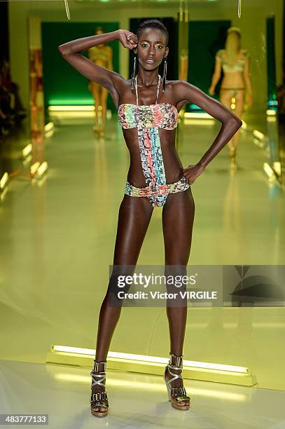 Model walks the runway during Movimento show at Sao Paulo Fashion Week Spring Summer 2014/2015 at Parque Candido Portinari on April 3, 2014 in Sao...