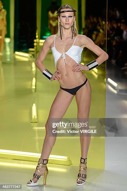 Model walks the runway during Movimento show at Sao Paulo Fashion Week Spring Summer 2014/2015 at Parque Candido Portinari on April 3, 2014 in Sao...