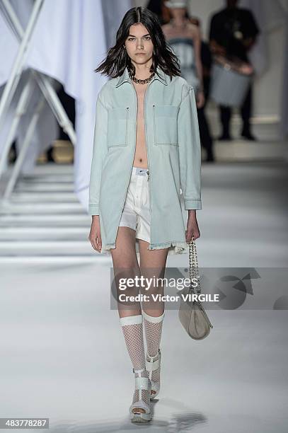 Model walks the runway during Ellus show at Sao Paulo Fashion Week Spring Summer 2014/2015 at Parque Candido Portinari on April 4, 2014 in Sao Paulo,...