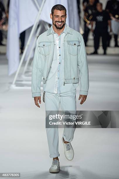 Actor Caua Reymond walks the runway during Ellus show at Sao Paulo Fashion Week Spring Summer 2014/2015 at Parque Candido Portinari on April 4, 2014...