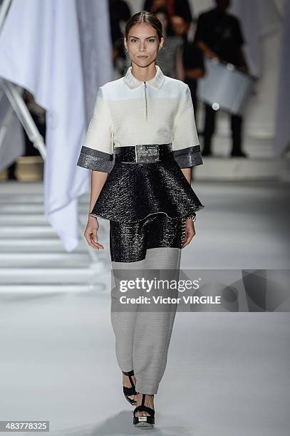 Model walks the runway during Ellus show at Sao Paulo Fashion Week Spring Summer 2014/2015 at Parque Candido Portinari on April 4, 2014 in Sao Paulo,...