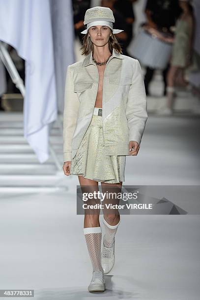 Model walks the runway during Ellus show at Sao Paulo Fashion Week Spring Summer 2014/2015 at Parque Candido Portinari on April 4, 2014 in Sao Paulo,...