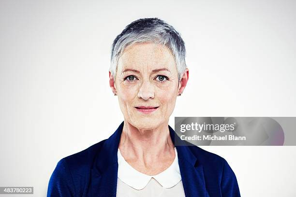 head and shoulders portrait of mature woman - grey hair close up stock pictures, royalty-free photos & images