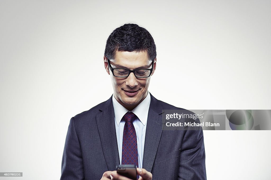 Portrait of a man with a mobile phone
