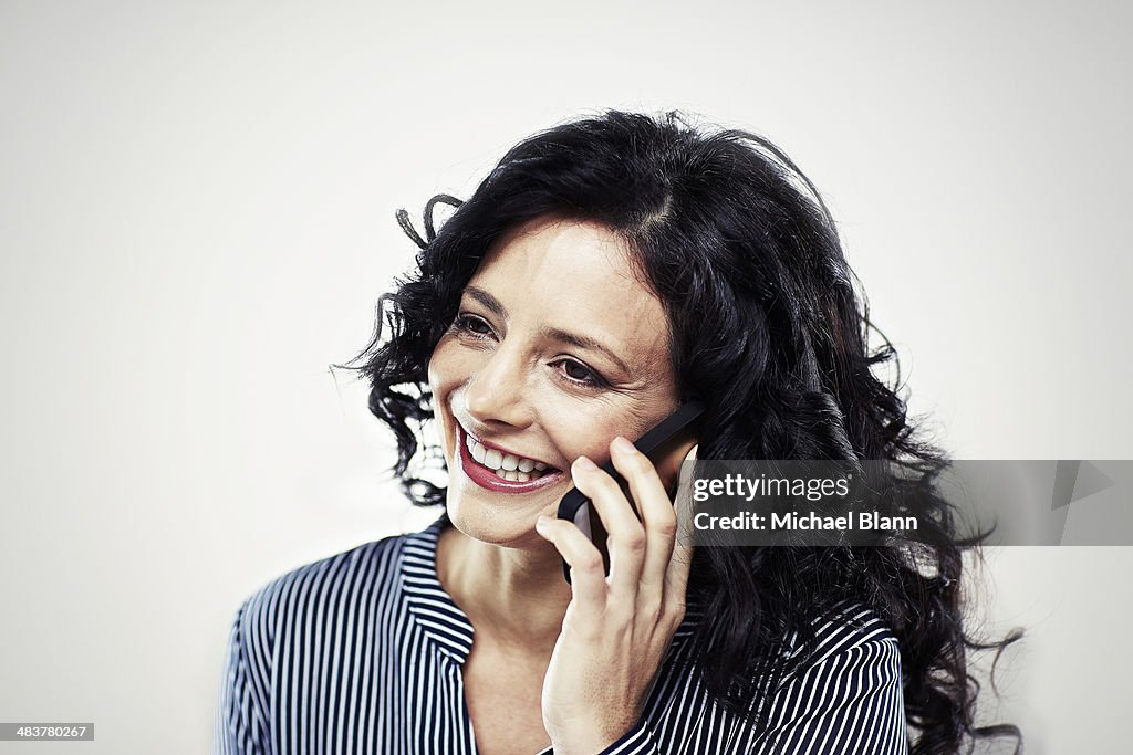 Portrait of a woman with a mobile phone