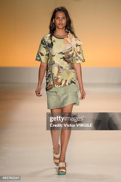 Model walks the runway during the Forum show at Sao Paulo Fashion Week Spring Summer 2014/2015 at Parque Candido Portinari on April 3, 2014 in Sao...