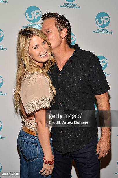 Vanessa Evigan and Greg Evigan attend the "Ties That Bind" red carpet premiere party at Pearl's Liquor Bar on August 12, 2015 in Hollywood,...