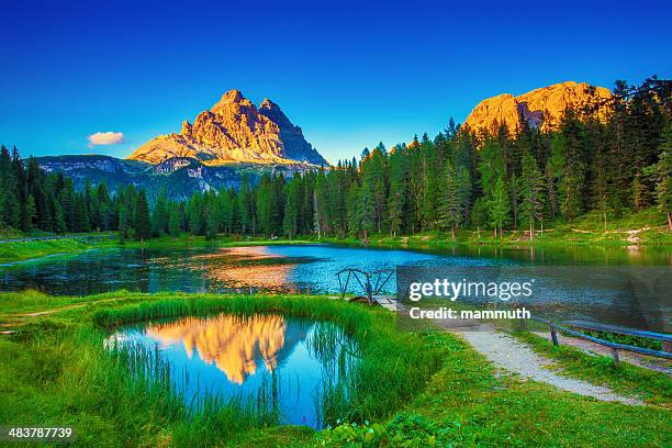 idyllic lake in the mountains - venezia stock pictures, royalty-free photos & images