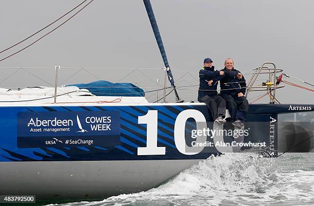 Mike Tindall with his wife Zara Phillips aboard Artemis Ocean Racing II during Aberdeen Asset Management Cowes Week Day Six on August 13, 2015 in...