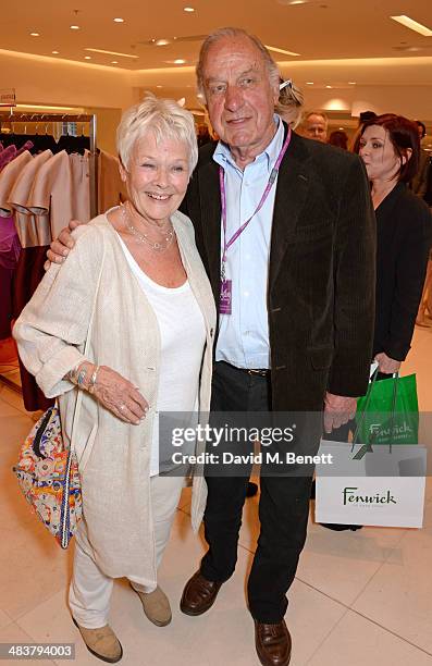 Dame Judi Dench and Geoffrey Palmer attend the Shop with the Stars, a public shopping evening to celebrate The Olivier Awards with MasterCard, to...