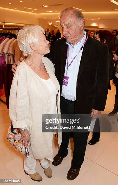 Dame Judi Dench and Geoffrey Palmer attend the Shop with the Stars, a public shopping evening to celebrate The Olivier Awards with MasterCard, to...