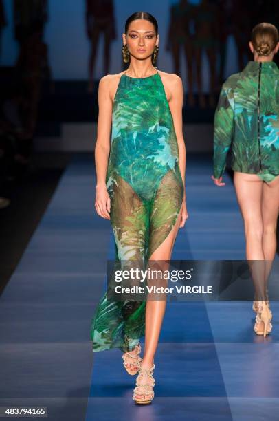 Bruna Tenorio walks the runway during the Agua de Coco por Liana Thomaz show at Sao Paulo Fashion Week Spring Summer 2014/2015 at Parque Candido...