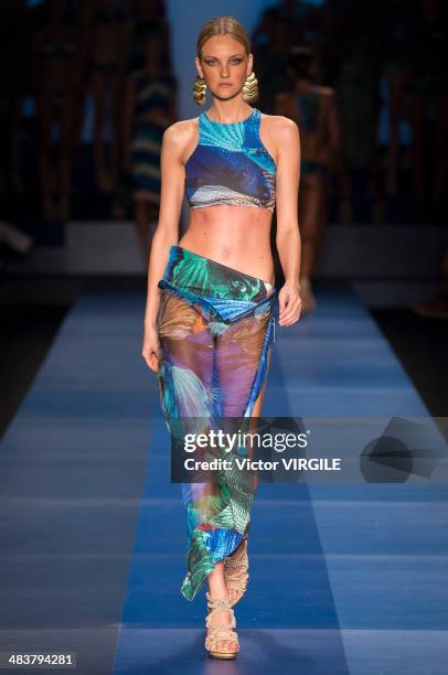 Carol Trentini walks the runway during the Agua de Coco por Liana Thomaz show at Sao Paulo Fashion Week Spring Summer 2014/2015 at Parque Candido...