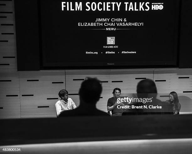 Senior editor of Film Comment magazine Nic Rapold, mountaineer/director Jimmy Chin and co-director Elizabeth Chai Vasarhelyi speak on stage during...