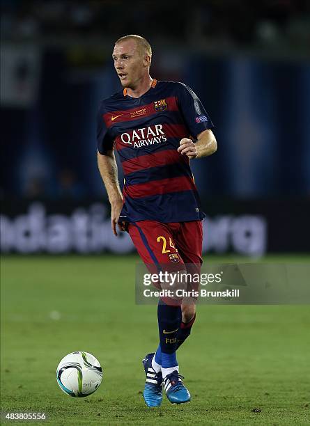 Jeremy Mathieu of Barcelona in action during the UEFA Super Cup match between Barcelona and Sevilla FC at Dinamo Stadium on August 11, 2015 in...