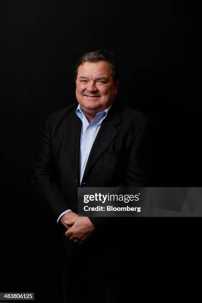 Jim "James" Flaherty, Canada's finance minister poses for a photograph following a Bloomberg Television interview on day three of the World Economic...