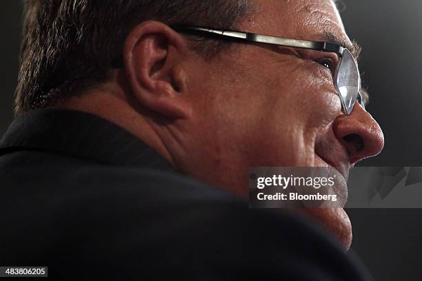 James "Jim" Flaherty, Canada's finance minister, smiles while speaking during a press conference after releasing the 2014 Federal Budget on...