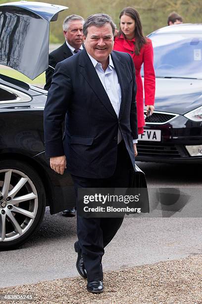 Jim "James" Flaherty, Canada's finance minister, smiles as he arrives to attend the Group of Seven finance ministers and central bank governors...