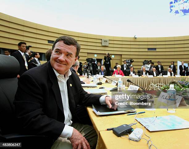 Jim "James" Flaherty, Canada's finance minister, poses prior to the start of the G8 Finance Ministers Meeting in Osaka, Japan, on Saturday, June 14,...