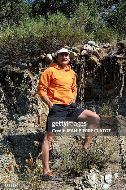 Swiss climber Ueli Steck poses in Sigoyer, in the Hautes-Alpes department of southeastern France, on August 13, 2015. Steck announced on August 12...