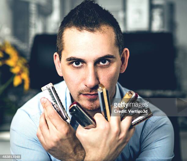 musician create the music - harmonica stock pictures, royalty-free photos & images